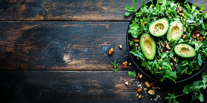 Sliced avocados surrounded by nutritious foods, highlighting their role in promoting digestive wellness.
