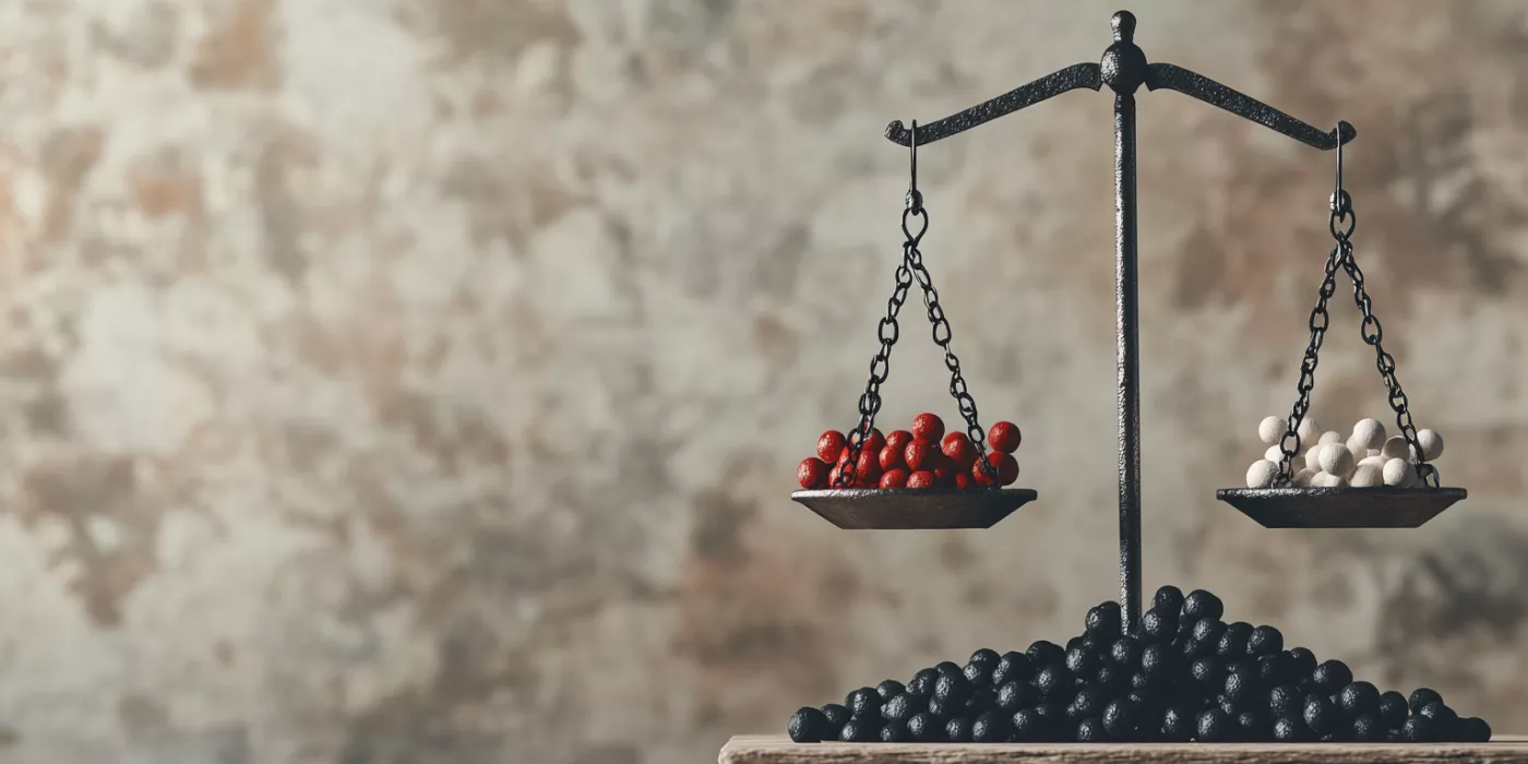 Balance scale showing imbalance of dopamine and serotonin related to mood and behavior in autism.