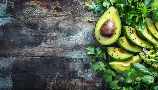 Sliced avocados with guacamole and herbs, symbolizing digestive health